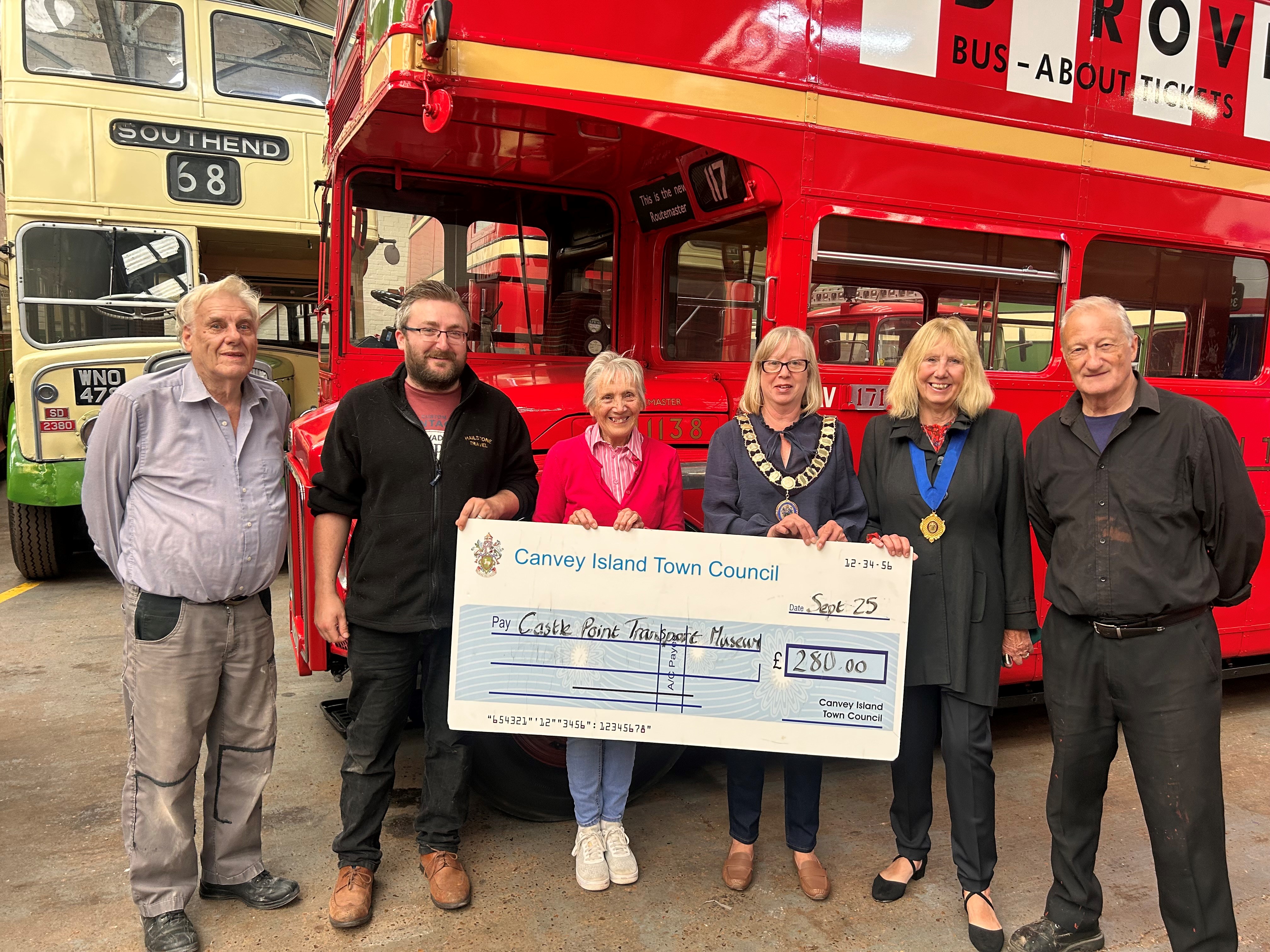 Cheque presentation to Castle Point Transport Museum with the Town Mayor and Deputy Town Mayor